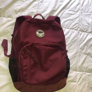 Burgundy Dr Martens backpack, used condition